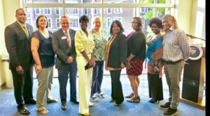 Program participants and organizers posing together at a 2019 event